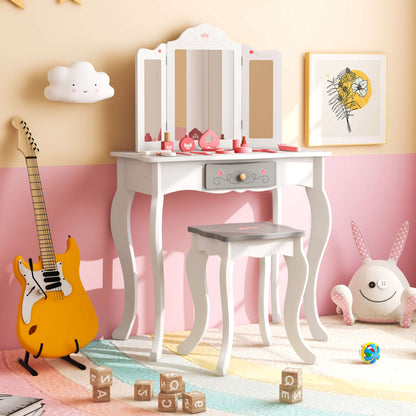 The kids vanity set placed in a colourful bedroom with a guitar and a plush toy nearby
