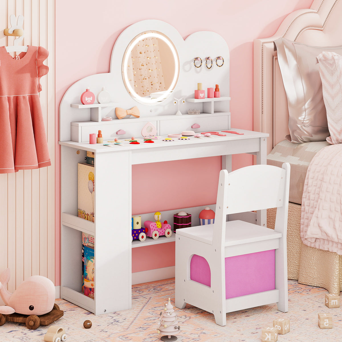 The white vanity table and chair set with a pink storage box in a child's bedroom