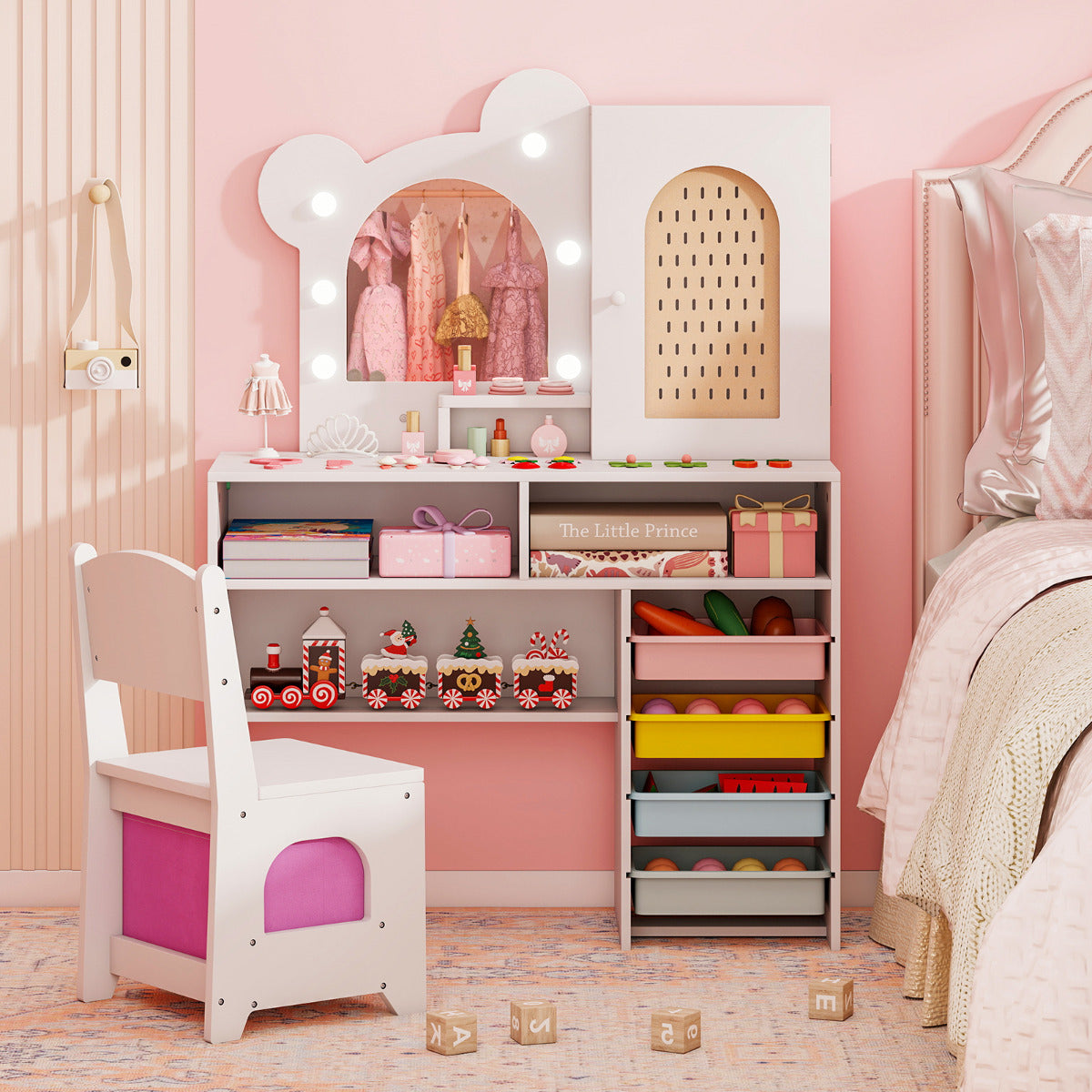The kids vanity table and chair placed in a child bedroom next to a bed