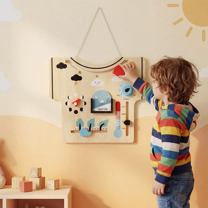 Child interacting with the wooden calendar about season and lunar phase, adjusting a dial