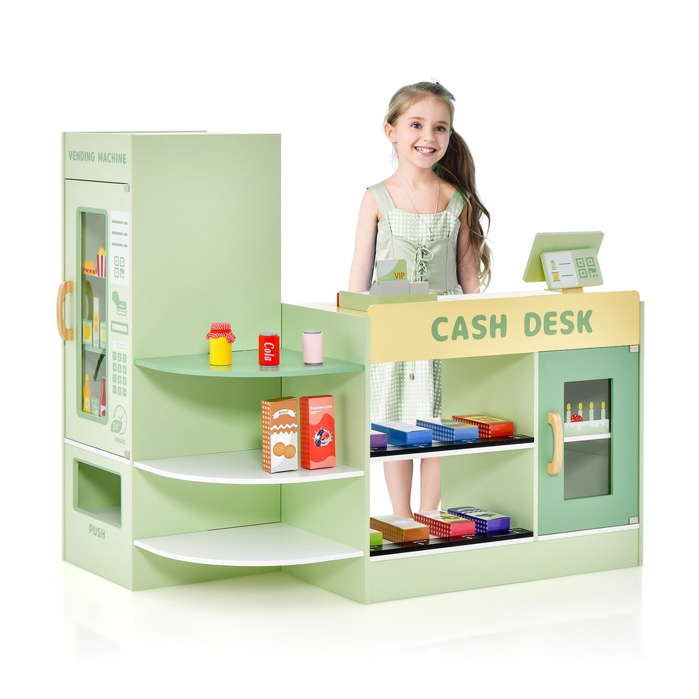Kids Wooden Grocery Store Supermarket Play Toy Set in green with a girl standing behind the cash desk