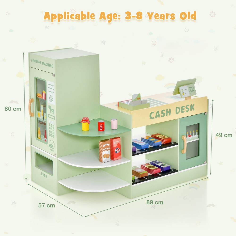 Dimensions of the green wooden grocery store play set shown with a child