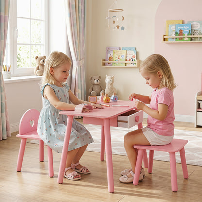 Two young girls playing at the pink wooden toddlers makeup and manicure table and chair set
