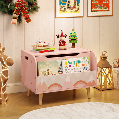 Pink wooden toy box with bookshelf decorated for Christmas in a living room