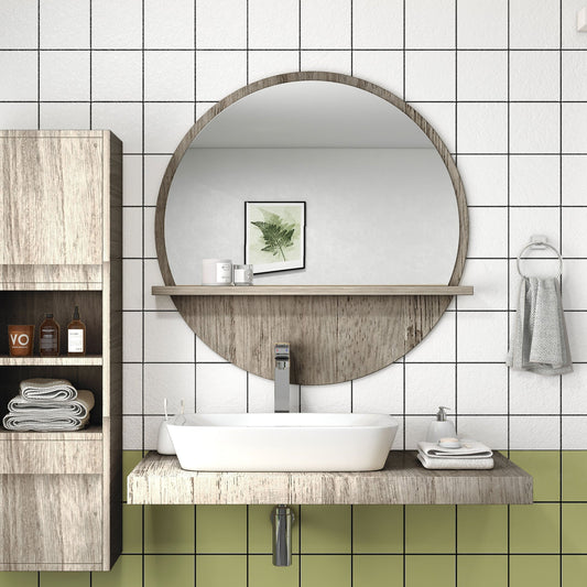 the bathroom mirror mounted on a tiled wall above a white sink and wooden vanity shelf
