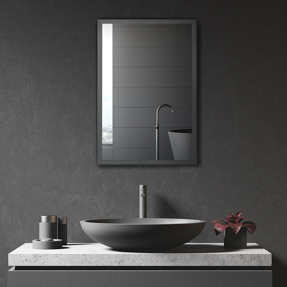 the bathroom mirror cabinet installed above a sink in a modern bathroom setting