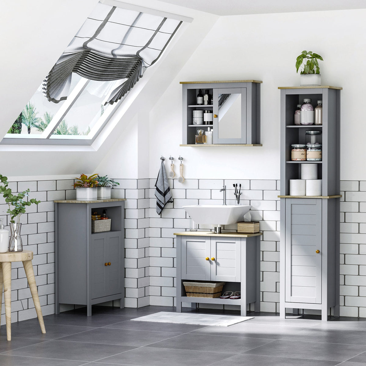 the bathroom cabinet as part of a matching furniture set in a bright attic room