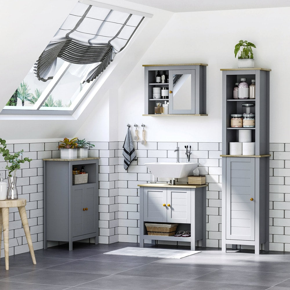 Grey bathroom storage cabinets in a room with a bath and sink