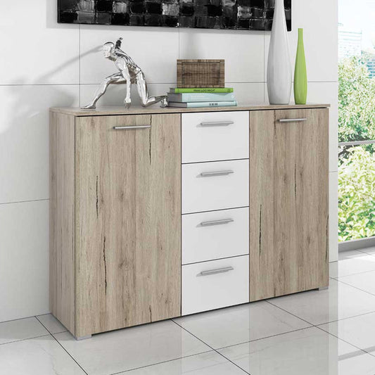 Wooden cabinet with doors and drawers in a room with a tiled floor and window.