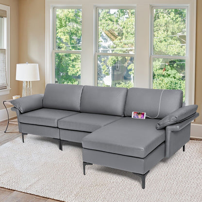 Grey upholstered sectional sofa with a phone charging via USB port