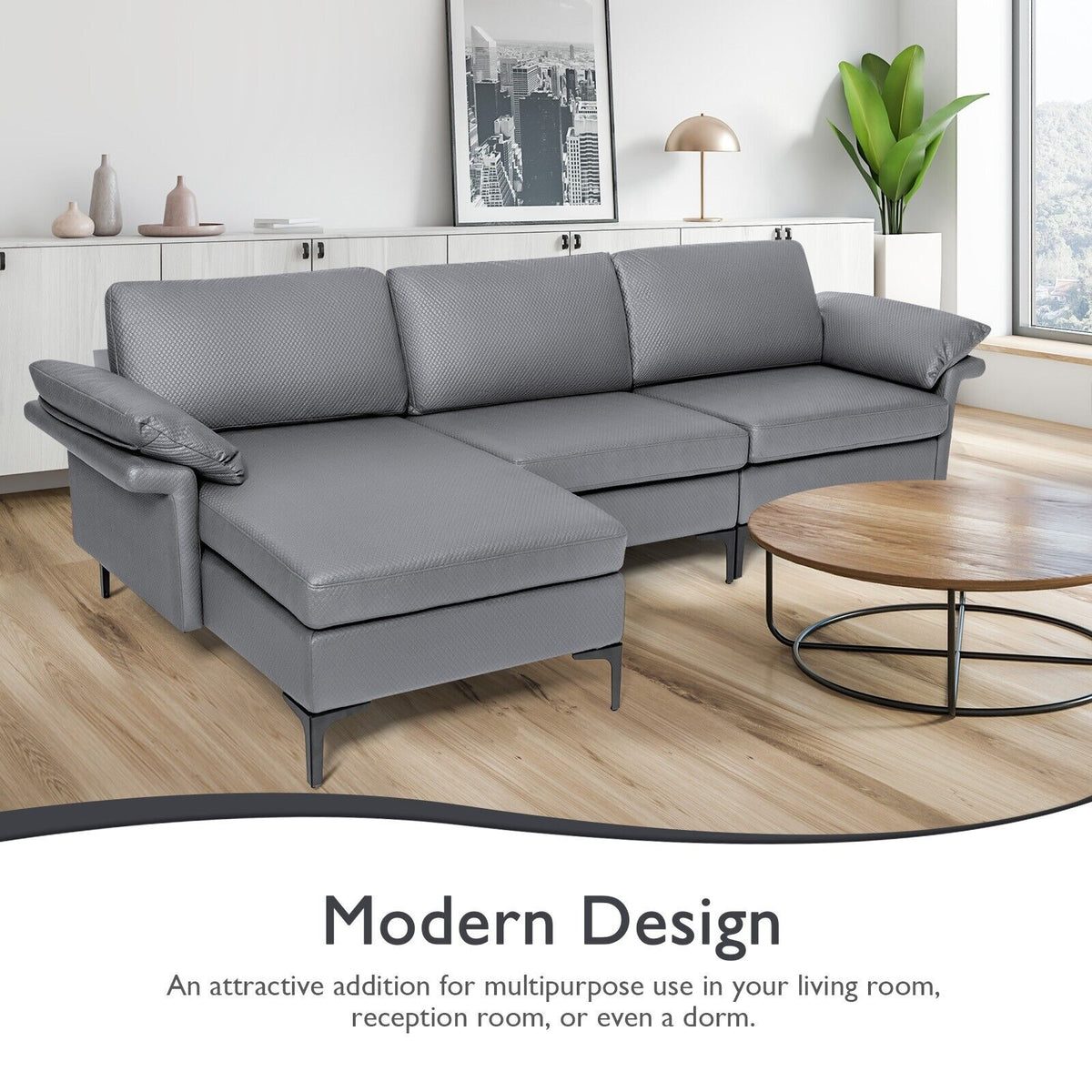 Grey upholstered sectional sofa in a reception room with coffee table