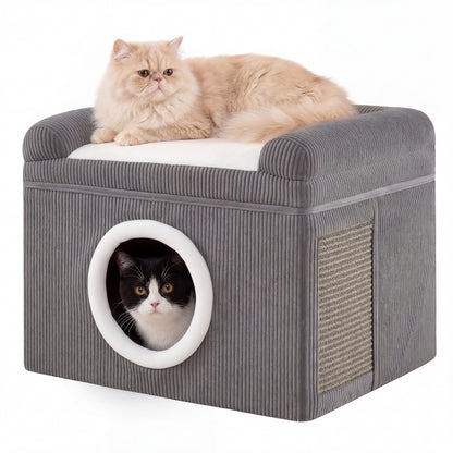 The large cat cave with a cat on top and another peeking out of the entrance hole