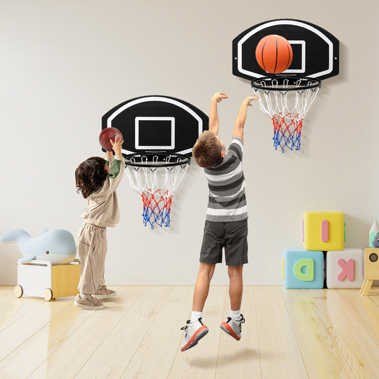 Children playing with the indoor wall mounted basketball set in a bright room