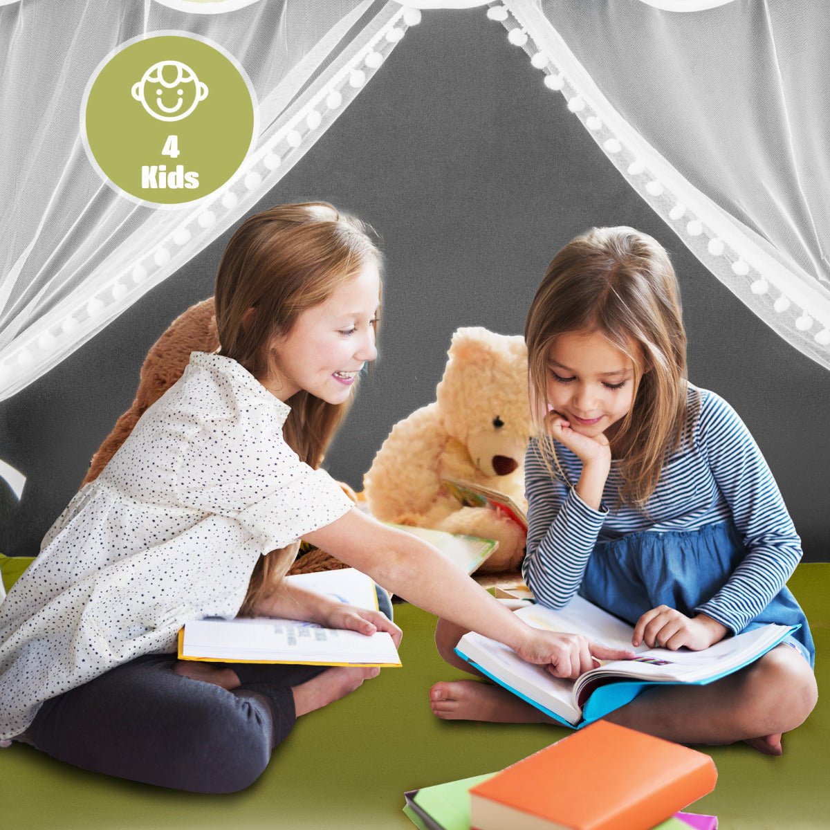 Two children reading books inside the play tent