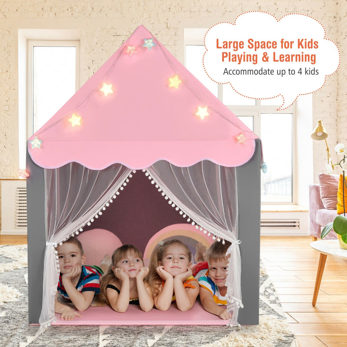 The play tent with four children sitting inside on the floor mat playing together