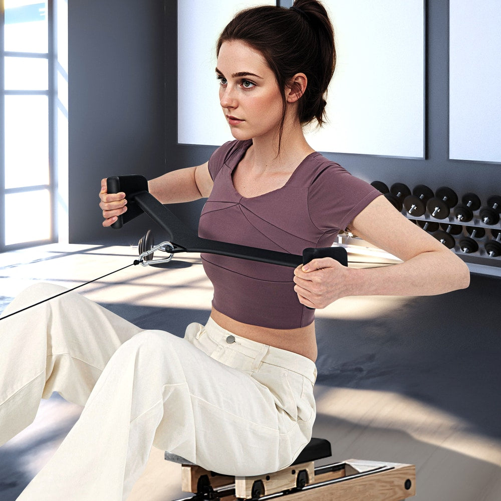 Woman using a V-bar attachment for a seated row exercise on a weight machine