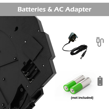 The game room board back panel showing the battery compartment and the power adapter