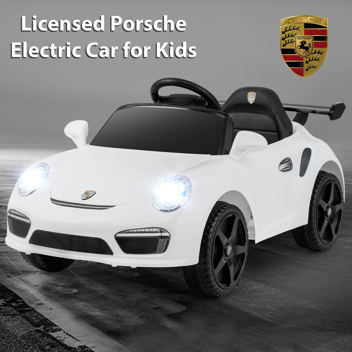 White kids electric car with Porsche badge and spoiler, showing the official branding