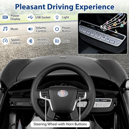 Close up of the steering wheel and dashboard of the black kids electric car