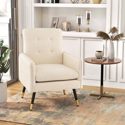 Beige accent chair in a living room setting with a side table and rug