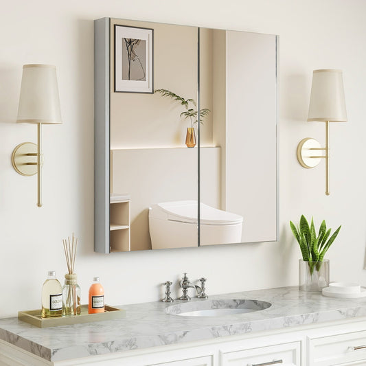 The grey medicine cabinet with mirrored doors installed above a sink and vanity unit