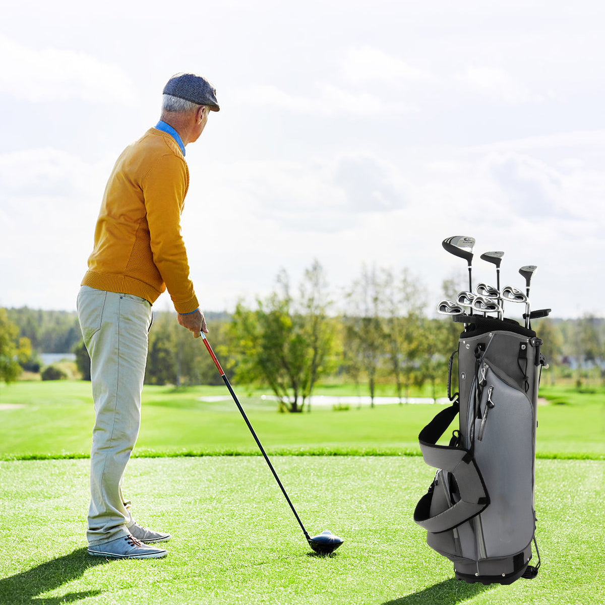 Older man playing golf with the grey golf clubs package set on a sunny day