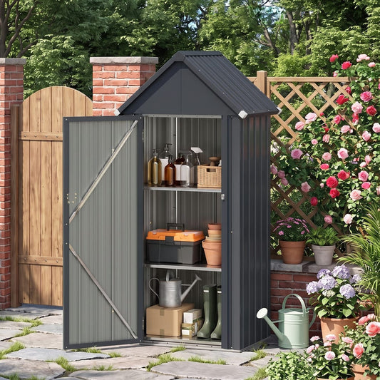 The dark grey garden tool shed is shown in a garden setting with the door open