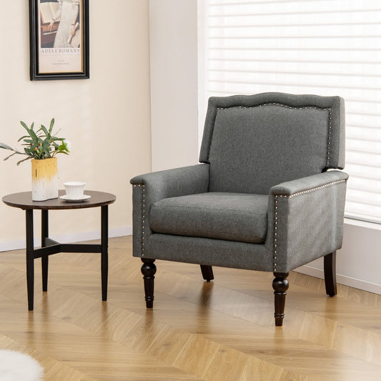 Mid-century Modern Armchair, the accent chair placed next to a small round side table in a bright living room setting