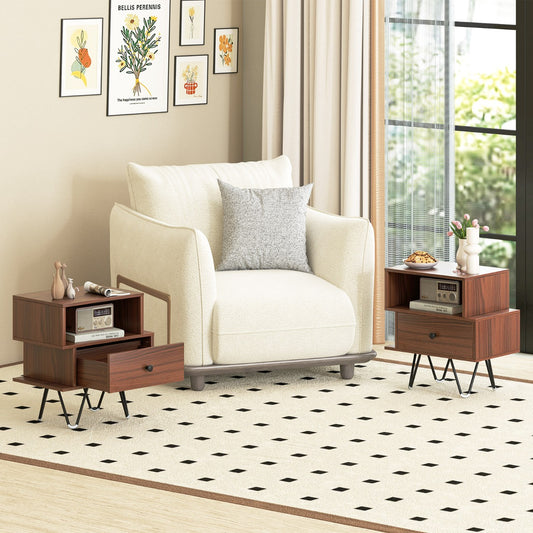 Two walnut bedside tables with drawers next to an armchair
