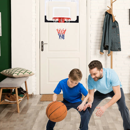 A father and son playing with the mini basketball hoop with shatterproof backboard indoors