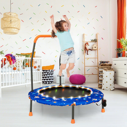 The blue children's trampoline in a nursery room with a child jumping