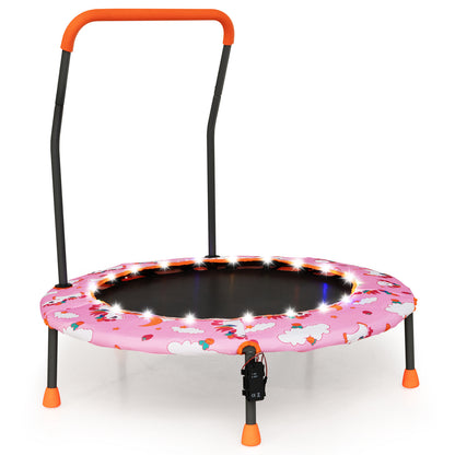 The pink kids trampoline with LED lights and safety handle shown from the front