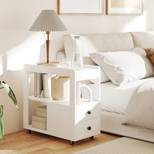 The side table placed next to a bed with a lamp and books on the shelves