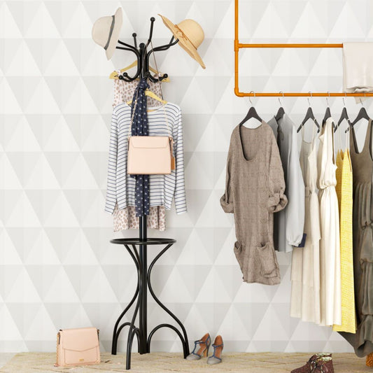 The coat rack placed in a modern bedroom next to a wall mounted clothes rail and accessories