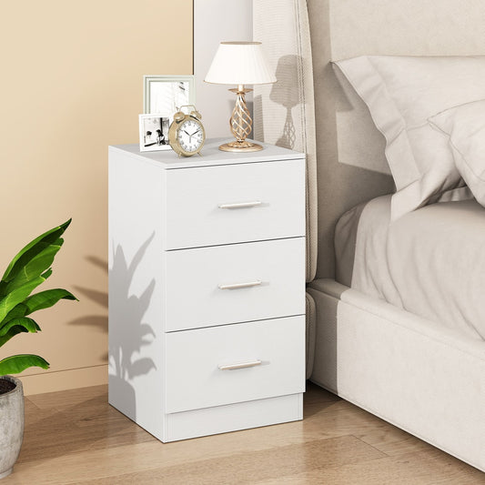The white nightstand is placed next to a bed in a bedroom setting
