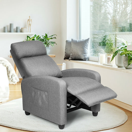 The grey recliner sofa lounge with footrest extended, shown in a bright room