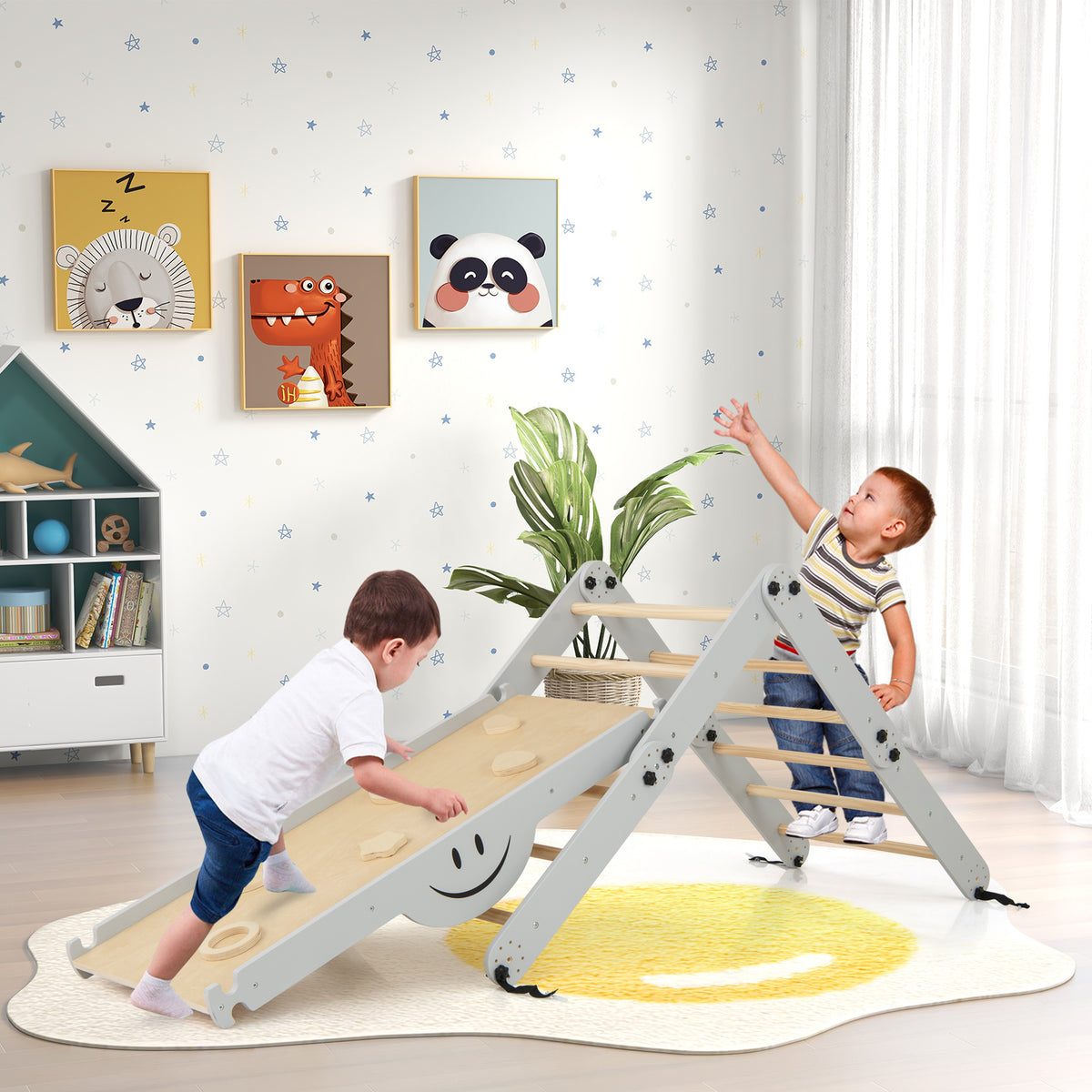 Toddlers playing on the grey and wood climbing frame in a bright nursery