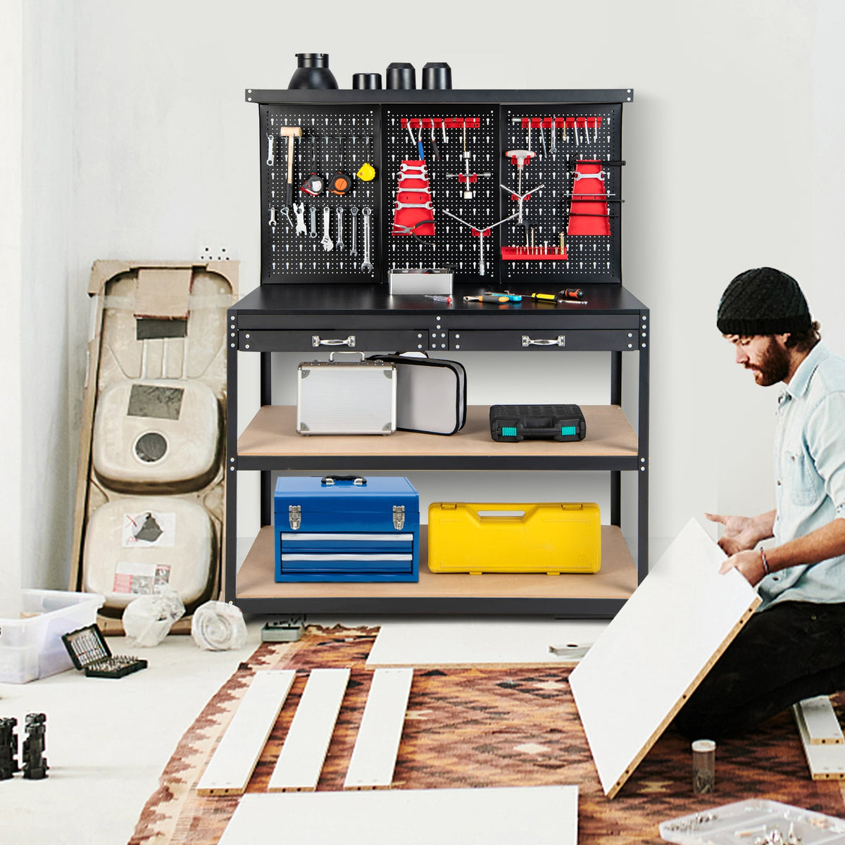 The garage worktable in a room where a man is assembling furniture on the floor