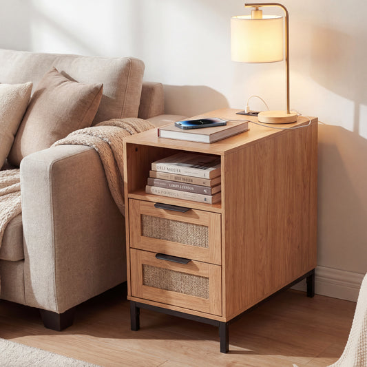 The narrow end table with charging station is placed next to a sofa in a living room