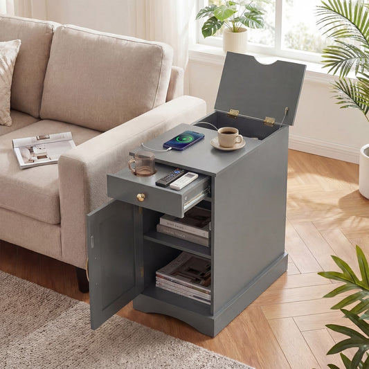 The grey narrow nightstand with its drawer and door open, showing shelves and charging station