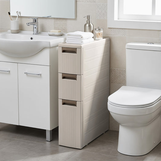 The narrow storage cabinet with wheels is shown next to a toilet and sink in a bathroom