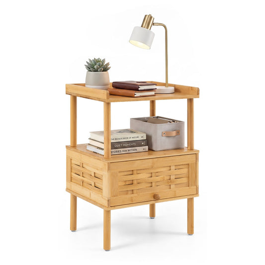 Natural Side Table with a lamp, books and a plant on the shelves against a white background