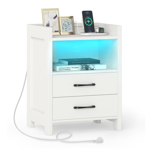 Nightstand with LED Lights and Power Outlets in white, showing the top shelf with framed pictures and a phone charging