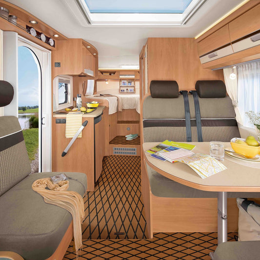 Brown boat decking sheet laid on the floor of a campervan interior