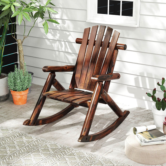 The patio rocking chair placed on a paved terrace next to a potted plant and a small stool