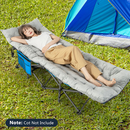 The camping furniture pad is shown in use on a cot with a woman resting on it outdoors