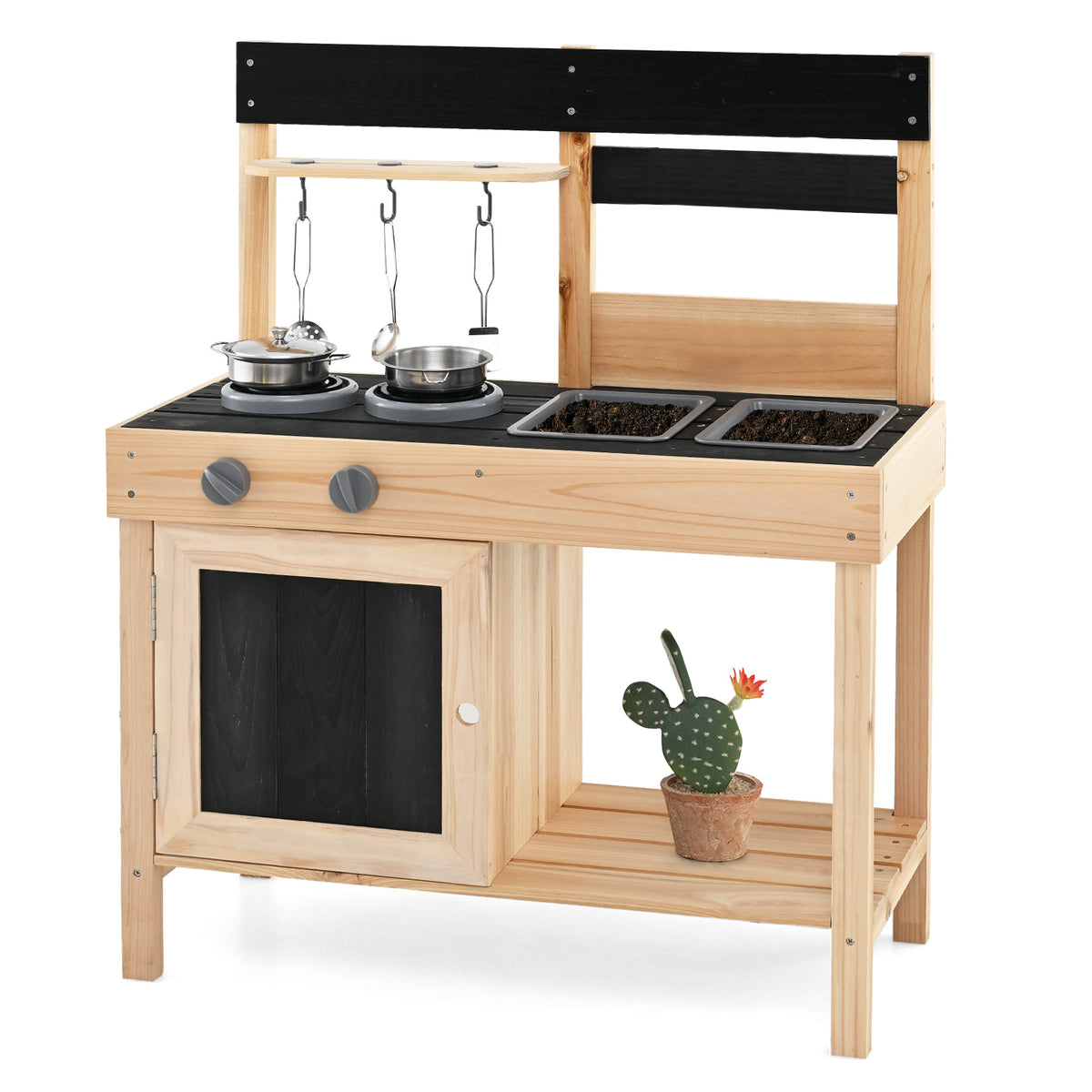 The play kitchen set with soil inside the two removable sinks