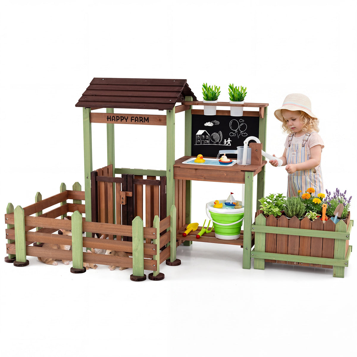 A young child waters plants in the raised planter box of the outdoor mud farm playset