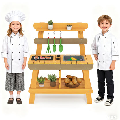 the play kitchen set with two children dressed as chefs and a basket of bread
