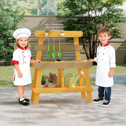 the wooden play kitchen with two children dressed as chefs standing either side